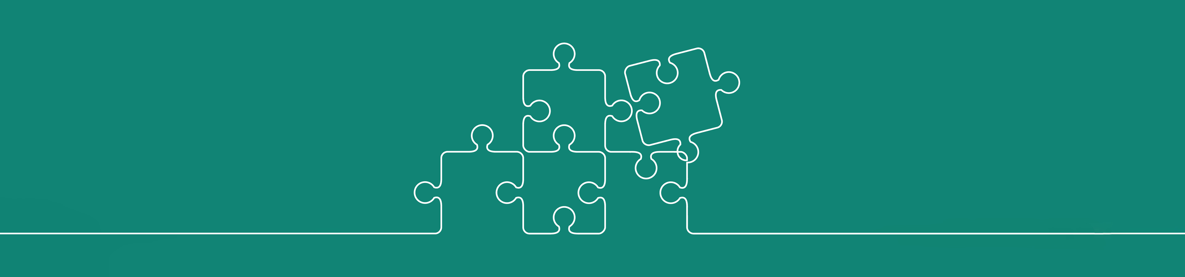 Puzzle Teile auf grünem Hintergrund